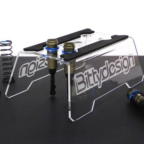 bittydesign-car-stand-110-18th-with-shock-set-up-station.jpg